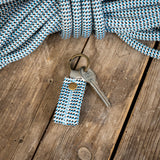 Blue, black and white climbing rope Keychains with one key