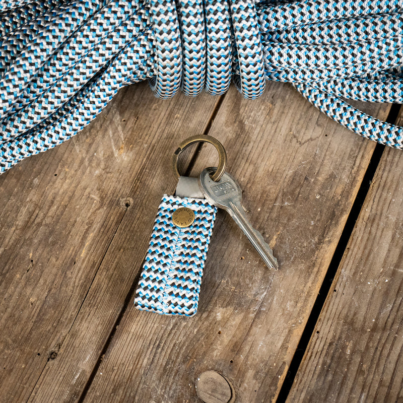 Blue, black and white climbing rope Keychains with one key