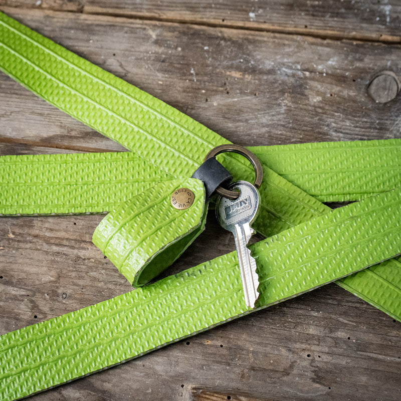 Green fire hose key ring with one key